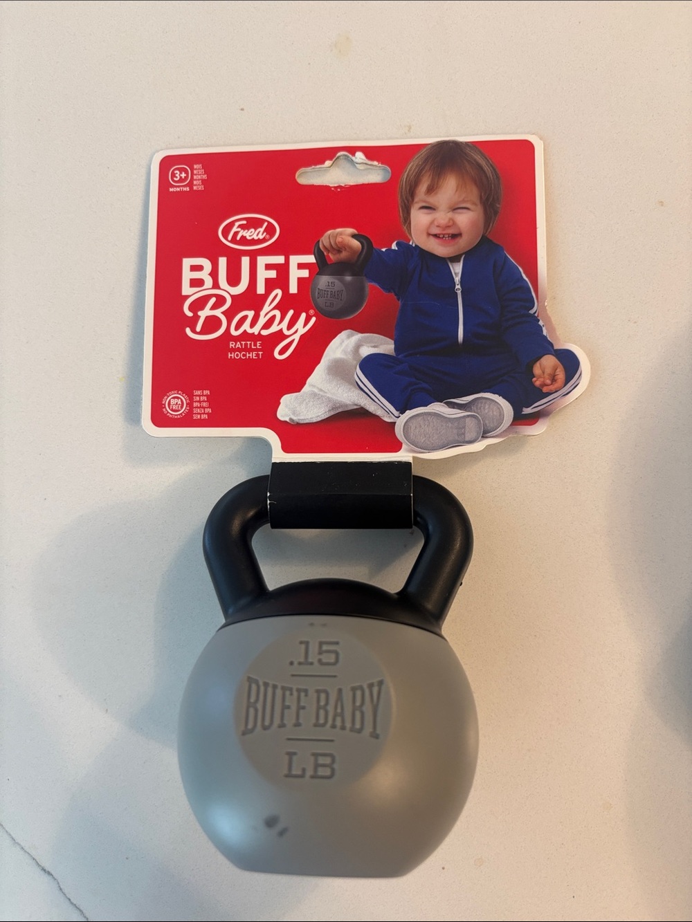 Fred Buff Baby Gray & Black Kettlebell Rattle